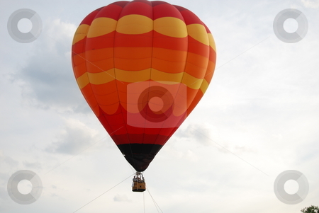 To use this stock image in your creative project, please select the size you need over to the right and click the "Add to Cart" button.
Your downloaded image will come with the Cutcaster watermark removed so don’t worry about the watermark you see on this page. Air Balloons stock photo, RI Hot Air Balloon Festival by Bill Parmentier