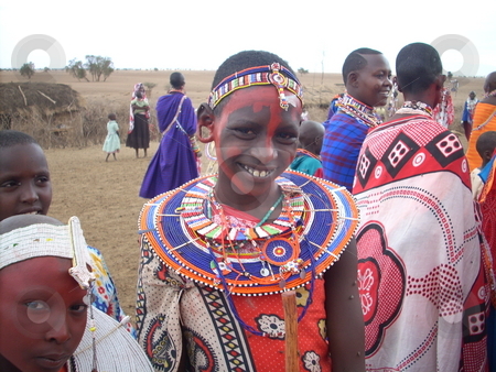 To use this stock image in your creative project, please select the size you need over to the right and click the "Add to Cart" button.
Your downloaded image will come with the Cutcaster watermark removed so don’t worry about the watermark you see on this page. Young Masai Girls stock photo, Beautiful young Masai girls with red ocre on their faces dressed in their bright colored traditional clothes and colorful beads by Rose Nthiwa