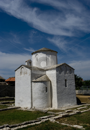 To use this stock image in your creative project, please select the size you need over to the right and click the "Add to Cart" button.
Your downloaded image will come with the Cutcaster watermark removed so don’t worry about the watermark you see on this page. The smallest cathedral in the world stock photo, This is told to be the world's smallest cathedral, build in the city Nin in Croatia, around year 800. It was the seat of Bishop Greogory. Nin is a beautiful old and quite small city at the west coast of Croatia. by Flemming Jacobsen