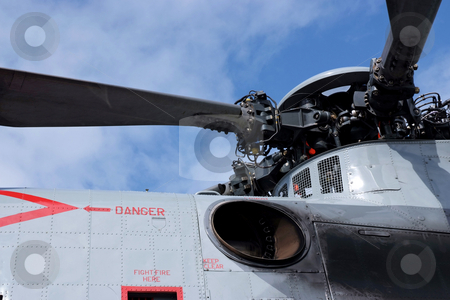 To use this stock image in your creative project, please select the size you need over to the right and click the "Add to Cart" button.
Your downloaded image will come with the Cutcaster watermark removed so don’t worry about the watermark you see on this page. Take-off stock photo, Roror blades and warning signs of a helicopter by Paul Phillips