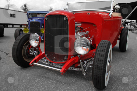 To use this stock image in your creative project, please select the size you need over to the right and click the "Add to Cart" button.
Your downloaded image will come with the Cutcaster watermark removed so don’t worry about the watermark you see on this page. Roadsters stock photo, Flashy roadsters at a southern car show Smyrna Georgia by Jack Schiffer