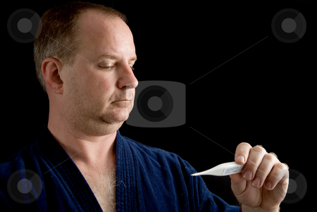 To use this stock image in your creative project, please select the size you need over to the right and click the "Add to Cart" button.
Your downloaded image will come with the Cutcaster watermark removed so don’t worry about the watermark you see on this page. Fever stock photo, A man checking his temperature with a thermometer. by Robert Byron