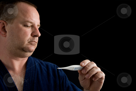 To use this stock image in your creative project, please select the size you need over to the right and click the "Add to Cart" button.
Your downloaded image will come with the Cutcaster watermark removed so don’t worry about the watermark you see on this page. Fever stock photo, A man checking his temperature with a thermometer. by Robert Byron