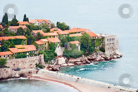 To use this stock image in your creative project, please select the size you need over to the right and click the "Add to Cart" button.
Your downloaded image will come with the Cutcaster watermark removed so don’t worry about the watermark you see on this page. Island in Adriatic sea stock photo, Small island Sveti Stefan in Adriatic sea in Montenegro by Julija Sapic