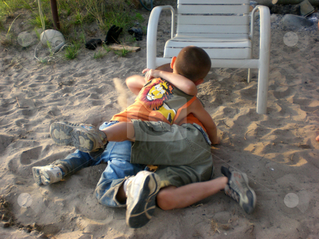 To use this stock image in your creative project, please select the size you need over to the right and click the "Add to Cart" button.
Your downloaded image will come with the Cutcaster watermark removed so don’t worry about the watermark you see on this page. Beach brothers battling stock photo, by J.G. Byers