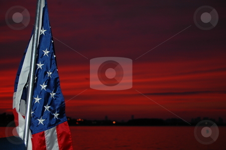 To use this stock image in your creative project, please select the size you need over to the right and click the "Add to Cart" button.
Your downloaded image will come with the Cutcaster watermark removed so don’t worry about the watermark you see on this page. Red Sky at night stock photo, by Richard Sheehan