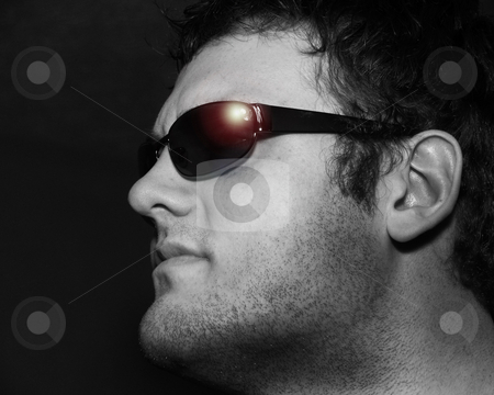 To use this stock image in your creative project, please select the size you need over to the right and click the "Add to Cart" button.
Your downloaded image will come with the Cutcaster watermark removed so don’t worry about the watermark you see on this page. Confident Young man stock photo, Self confident young man with sunglasses in black and white with sun reflection in glasses by Anita Peppers