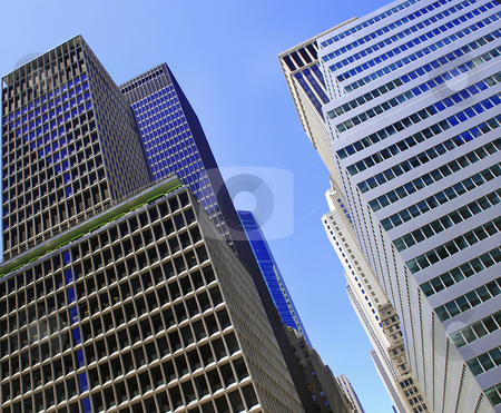 To use this stock image in your creative project, please select the size you need over to the right and click the "Add to Cart" button.
Your downloaded image will come with the Cutcaster watermark removed so don’t worry about the watermark you see on this page. Office modern buildings stock photo, Modern office buildings in New York over blue sky by Julija Sapic