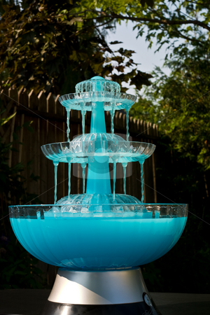 To use this stock image in your creative project, please select the size you need over to the right and click the "Add to Cart" button.
Your downloaded image will come with the Cutcaster watermark removed so don’t worry about the watermark you see on this page. Blue Drink Fountain stock photo, Dark blue fountain with a cool drink cascade by Johan Knelsen