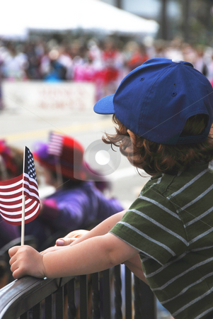 To use this stock image in your creative project, please select the size you need over to the right and click the "Add to Cart" button.
Your downloaded image will come with the Cutcaster watermark removed so don’t worry about the watermark you see on this page. Fun at the Parade stock photo, Little boy at a parade. by Timothy OLeary
