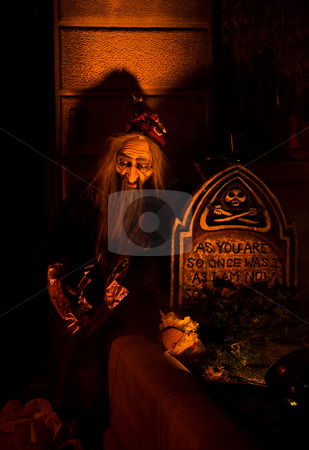 To use this stock image in your creative project, please select the size you need over to the right and click the "Add to Cart" button.
Your downloaded image will come with the Cutcaster watermark removed so don’t worry about the watermark you see on this page. Graveyard shift stock photo, Old bearded man (puppet) sitting at a graveyard at a lit up tomb; a Halloween set-up by Paul Hakimata