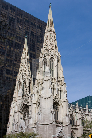 To use this stock image in your creative project, please select the size you need over to the right and click the "Add to Cart" button.
Your downloaded image will come with the Cutcaster watermark removed so don’t worry about the watermark you see on this page. St. Patrick Cathedral stock photo, The facade of the Saint Patrick Cathedral in New York City, on a deep blue sky by Paul Hakimata