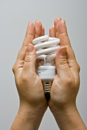 To use this stock image in your creative project, please select the size you need over to the right and click the "Add to Cart" button.
Your downloaded image will come with the Cutcaster watermark removed so don’t worry about the watermark you see on this page. Presenting Power-saver stock photo, Two female hands presenting an environmental friendly and power saving fluorescent light bulb. by Paul Hakimata