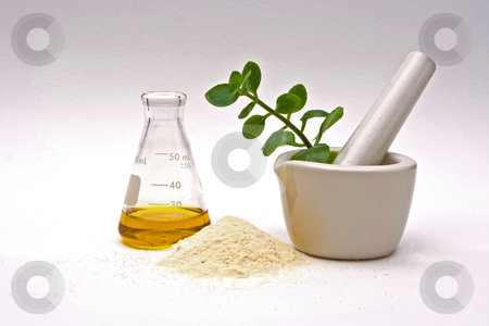 To use this stock image in your creative project, please select the size you need over to the right and click the "Add to Cart" button.
Your downloaded image will come with the Cutcaster watermark removed so don’t worry about the watermark you see on this page. Natural chemistry stock photo, A yellow liquid in a flask with a powder in front and a white mortar with asome leaves in it on a white background by Paul Hakimata
