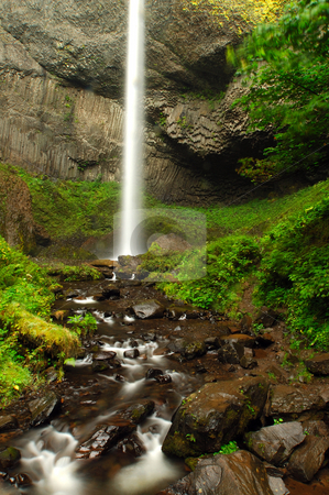 To use this stock image in your creative project, please select the size you need over to the right and click the "Add to Cart" button.
Your downloaded image will come with the Cutcaster watermark removed so don’t worry about the watermark you see on this page. Falls of gold stock photo, Latourel falls with the adjoining stream by Nilanjan Bhattacharya