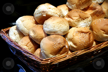 To use this stock image in your creative project, please select the size you need over to the right and click the "Add to Cart" button.
Your downloaded image will come with the Cutcaster watermark removed so don’t worry about the watermark you see on this page. Dinner rolls stock photo, Dinner rolls in a basket in restaurant buffet by Kheng Guan Toh