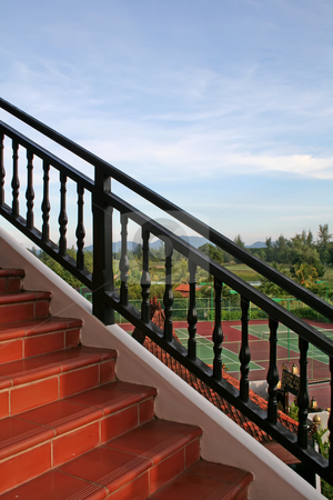 To use this stock image in your creative project, please select the size you need over to the right and click the "Add to Cart" button.
Your downloaded image will come with the Cutcaster watermark removed so don’t worry about the watermark you see on this page. Outdoor stairs stock photo, Outdoor stairs with scenic panoramic view tiles and banister by Kheng Guan Toh