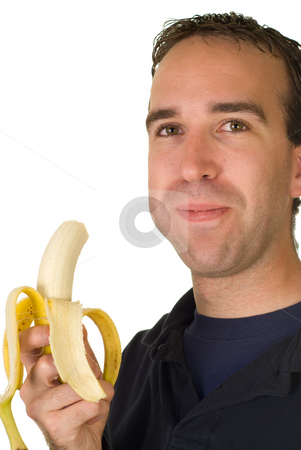 To use this stock image in your creative project, please select the size you need over to the right and click the "Add to Cart" button.
Your downloaded image will come with the Cutcaster watermark removed so don’t worry about the watermark you see on this page. Banana Man stock photo, A man chewing a fresh banana, isolated on a white background by Richard Nelson