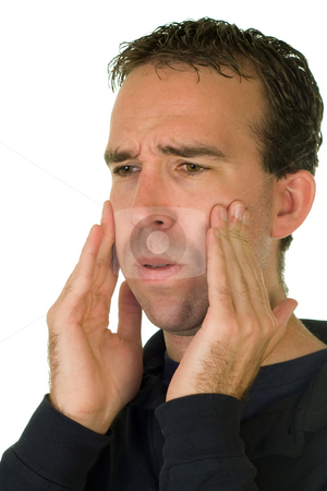 To use this stock image in your creative project, please select the size you need over to the right and click the "Add to Cart" button.
Your downloaded image will come with the Cutcaster watermark removed so don’t worry about the watermark you see on this page. Pulled Wisdom Teeth stock photo, A man feeling his cheeks where his wisdom teeth used to be by Richard Nelson