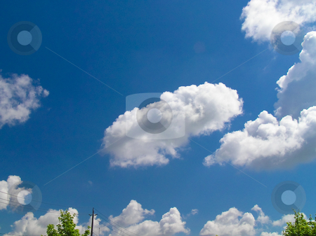 To use this stock image in your creative project, please select the size you need over to the right and click the "Add to Cart" button.
Your downloaded image will come with the Cutcaster watermark removed so don’t worry about the watermark you see on this page. White Clouds In A Blue Sky stock photo, White Clouds in A Bright Blue Sky by Johan Knelsen