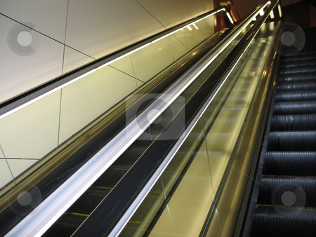 To use this stock image in your creative project, please select the size you need over to the right and click the "Add to Cart" button.
Your downloaded image will come with the Cutcaster watermark removed so don’t worry about the watermark you see on this page. Black escalator stock photo, by Mbudley Mbudley