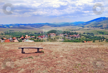 To use this stock image in your creative project, please select the size you need over to the right and click the "Add to Cart" button.
Your downloaded image will come with the Cutcaster watermark removed so don’t worry about the watermark you see on this page. Rural landscape stock photo, View on serbian village, hills and meadows by Julija Sapic