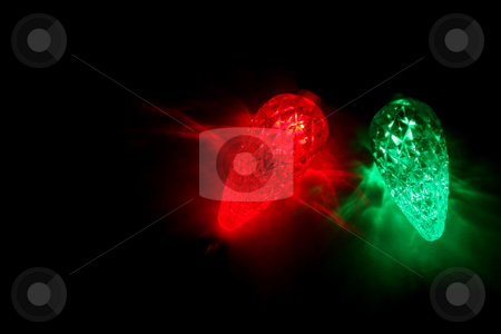 To use this stock image in your creative project, please select the size you need over to the right and click the "Add to Cart" button.
Your downloaded image will come with the Cutcaster watermark removed so don’t worry about the watermark you see on this page. Two Christmas Lights stock photo, Red and green LED Christmas lights. by Chris Hill