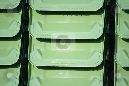 To use this stock image in your creative project, please select the size you need over to the right and click the "Add to Cart" button.
Your downloaded image will come with the Cutcaster watermark removed so don’t worry about the watermark you see on this page. Backgorund Lids stock photo, Garbage Can Lids stacked as a background by Robert Cabrera