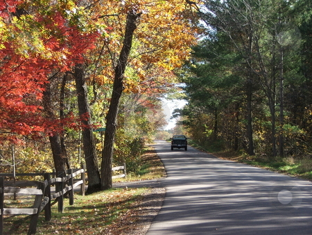 To use this stock image in your creative project, please select the size you need over to the right and click the "Add to Cart" button.
Your downloaded image will come with the Cutcaster watermark removed so don’t worry about the watermark you see on this page. Blazing Fall Colors stock photo, This picturesque view of blazing fall colors on a back road near Cross Lake, MN suggests a relaxing escape (October, 2007). by Dennis Thomsen