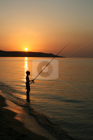 To use this stock image in your creative project, please select the size you need over to the right and click the "Add to Cart" button.
Your downloaded image will come with the Cutcaster watermark removed so don’t worry about the watermark you see on this page. The silhouette of one fisherboy on the sea. stock photo, The silhouette of one fisherboy on the Sea of Azov against the background of the sundown and mountains. by Viachaslau Barysevich