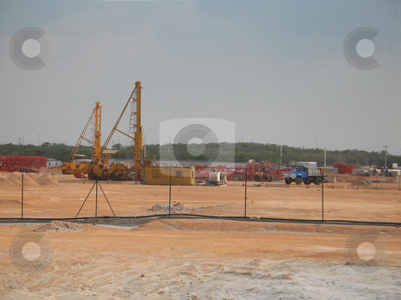 To use this stock image in your creative project, please select the size you need over to the right and click the "Add to Cart" button.
Your downloaded image will come with the Cutcaster watermark removed so don’t worry about the watermark you see on this page. Large construction site stock photo, by Mbudley Mbudley