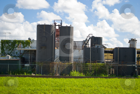 To use this stock image in your creative project, please select the size you need over to the right and click the "Add to Cart" button.
Your downloaded image will come with the Cutcaster watermark removed so don’t worry about the watermark you see on this page. Old Tar Processing Plant stock photo, Old an weathered Tar Processing and storage plant by Robert Cabrera