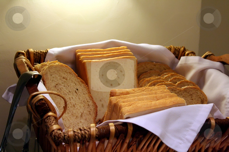To use this stock image in your creative project, please select the size you need over to the right and click the "Add to Cart" button.
Your downloaded image will come with the Cutcaster watermark removed so don’t worry about the watermark you see on this page. Sliced bread stock photo, Sliced bread in a basket part of restaurant buffet breakfast by Kheng Guan Toh