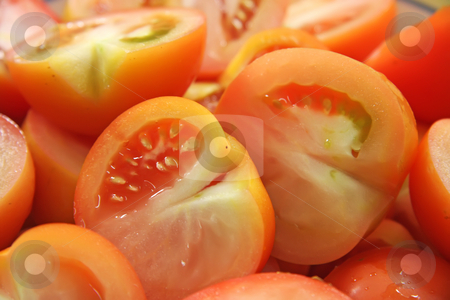 To use this stock image in your creative project, please select the size you need over to the right and click the "Add to Cart" button.
Your downloaded image will come with the Cutcaster watermark removed so don’t worry about the watermark you see on this page. Sliced tomatoes stock photo, Fresh cut sliced raw red tomatoes arranged in bowl by Kheng Guan Toh