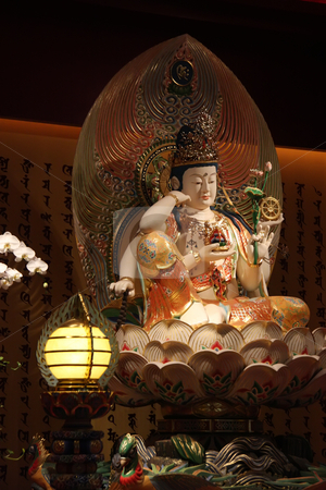 To use this stock image in your creative project, please select the size you need over to the right and click the "Add to Cart" button.
Your downloaded image will come with the Cutcaster watermark removed so don’t worry about the watermark you see on this page. Golden buddha statue stock photo, Golden statue of buddha inside a chinese temple by Kheng Guan Toh