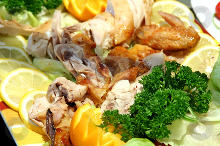 To use this stock image in your creative project, please select the size you need over to the right and click the "Add to Cart" button.
Your downloaded image will come with the Cutcaster watermark removed so don’t worry about the watermark you see on this page. Roast chicken stock photo, Chopped roast chicken parts in restaurant presentation by Kheng Guan Toh