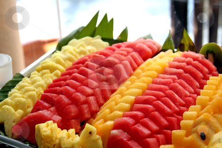 To use this stock image in your creative project, please select the size you need over to the right and click the "Add to Cart" button.
Your downloaded image will come with the Cutcaster watermark removed so don’t worry about the watermark you see on this page. Tropical fruits stock photo, Platter of cut tropical fruits watermelon pineapple by Kheng Guan Toh