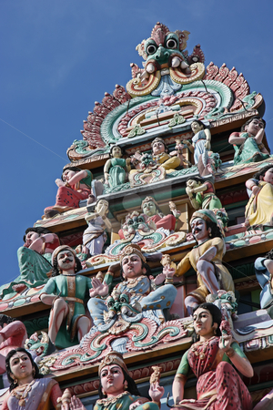 To use this stock image in your creative project, please select the size you need over to the right and click the "Add to Cart" button.
Your downloaded image will come with the Cutcaster watermark removed so don’t worry about the watermark you see on this page. Hindu temple stock photo, Ornate statues in indian temple depicting hindu gods by Kheng Guan Toh