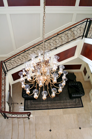 To use this stock image in your creative project, please select the size you need over to the right and click the "Add to Cart" button.
Your downloaded image will come with the Cutcaster watermark removed so don’t worry about the watermark you see on this page. Elegant chandelier stock photo, Elegant chandelier and staircase luxurious interior design by Kheng Guan Toh