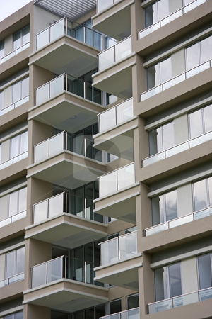 To use this stock image in your creative project, please select the size you need over to the right and click the "Add to Cart" button.
Your downloaded image will come with the Cutcaster watermark removed so don’t worry about the watermark you see on this page. Modern apartments stock photo, Modern apartment buildings closeup of glass balconies by Kheng Guan Toh