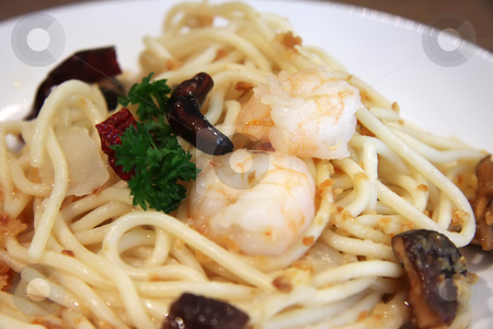 To use this stock image in your creative project, please select the size you need over to the right and click the "Add to Cart" button.
Your downloaded image will come with the Cutcaster watermark removed so don’t worry about the watermark you see on this page. Pasta ala oglio stock photo, Pasta ala oglio with shrimp Italian cuisine by Kheng Guan Toh