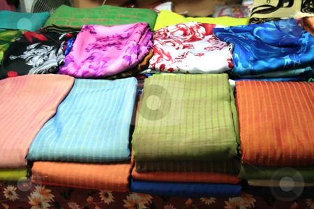 To use this stock image in your creative project, please select the size you need over to the right and click the "Add to Cart" button.
Your downloaded image will come with the Cutcaster watermark removed so don’t worry about the watermark you see on this page. Traditional asian fabrics stock photo, Traditional asian fabrics and clothes for sale in a shop in Malaysia by Kheng Guan Toh