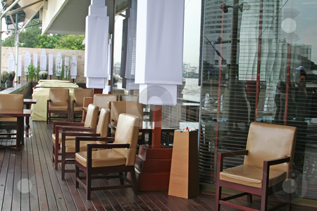 To use this stock image in your creative project, please select the size you need over to the right and click the "Add to Cart" button.
Your downloaded image will come with the Cutcaster watermark removed so don’t worry about the watermark you see on this page. Elegant chairs stock photo, Cafe lounge waiting area with elegant chairs by Kheng Guan Toh