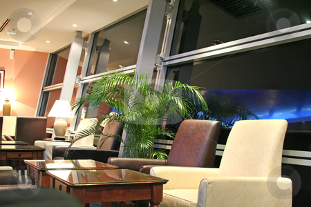To use this stock image in your creative project, please select the size you need over to the right and click the "Add to Cart" button.
Your downloaded image will come with the Cutcaster watermark removed so don’t worry about the watermark you see on this page. Airport lounge stock photo, Airport business class executive lounge at night by Kheng Guan Toh