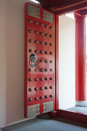 To use this stock image in your creative project, please select the size you need over to the right and click the "Add to Cart" button.
Your downloaded image will come with the Cutcaster watermark removed so don’t worry about the watermark you see on this page. Chinese temple doorway stock photo, Architectural detail of traditional chinese temple doorway gate by Kheng Guan Toh