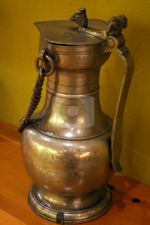 To use this stock image in your creative project, please select the size you need over to the right and click the "Add to Cart" button.
Your downloaded image will come with the Cutcaster watermark removed so don’t worry about the watermark you see on this page. Antique pitcher stock photo, Antique brass pitch found in European museum by Kheng Guan Toh