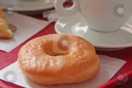 To use this stock image in your creative project, please select the size you need over to the right and click the "Add to Cart" button.
Your downloaded image will come with the Cutcaster watermark removed so don’t worry about the watermark you see on this page. Donut and coffee stock photo, Donut and coffee mug on a fast food tray by Kheng Guan Toh