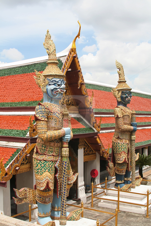 To use this stock image in your creative project, please select the size you need over to the right and click the "Add to Cart" button.
Your downloaded image will come with the Cutcaster watermark removed so don’t worry about the watermark you see on this page. Emerald buddha temple stock photo, Guardian statues in Emerald buddha temple in Bangkok thailand by Kheng Guan Toh
