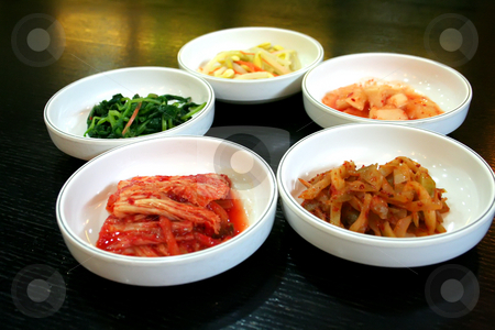 To use this stock image in your creative project, please select the size you need over to the right and click the "Add to Cart" button.
Your downloaded image will come with the Cutcaster watermark removed so don’t worry about the watermark you see on this page. Bowls of kimchi stock photo, Bowls of Kimchi traditional Korean spicy vegetable pickles by Kheng Guan Toh