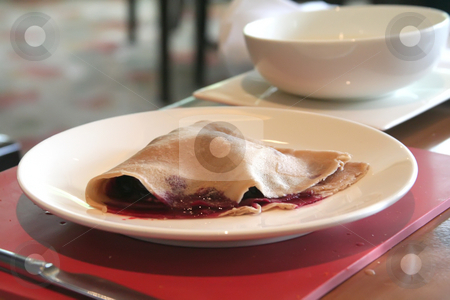 To use this stock image in your creative project, please select the size you need over to the right and click the "Add to Cart" button.
Your downloaded image will come with the Cutcaster watermark removed so don’t worry about the watermark you see on this page. Crepe with filling stock photo, Crepe with jam filling on white plate in restaurant by Kheng Guan Toh